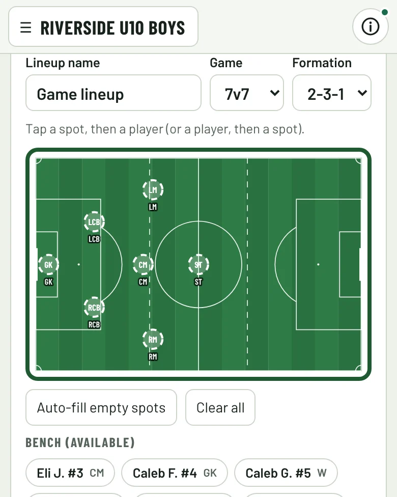 A lineup on a soccer field, with the bench below it.